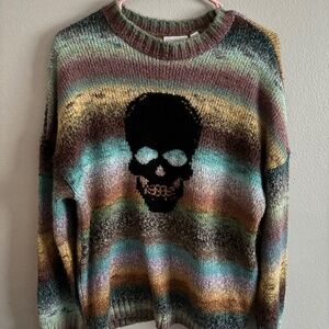 Ragged jeans oversized skull sweater